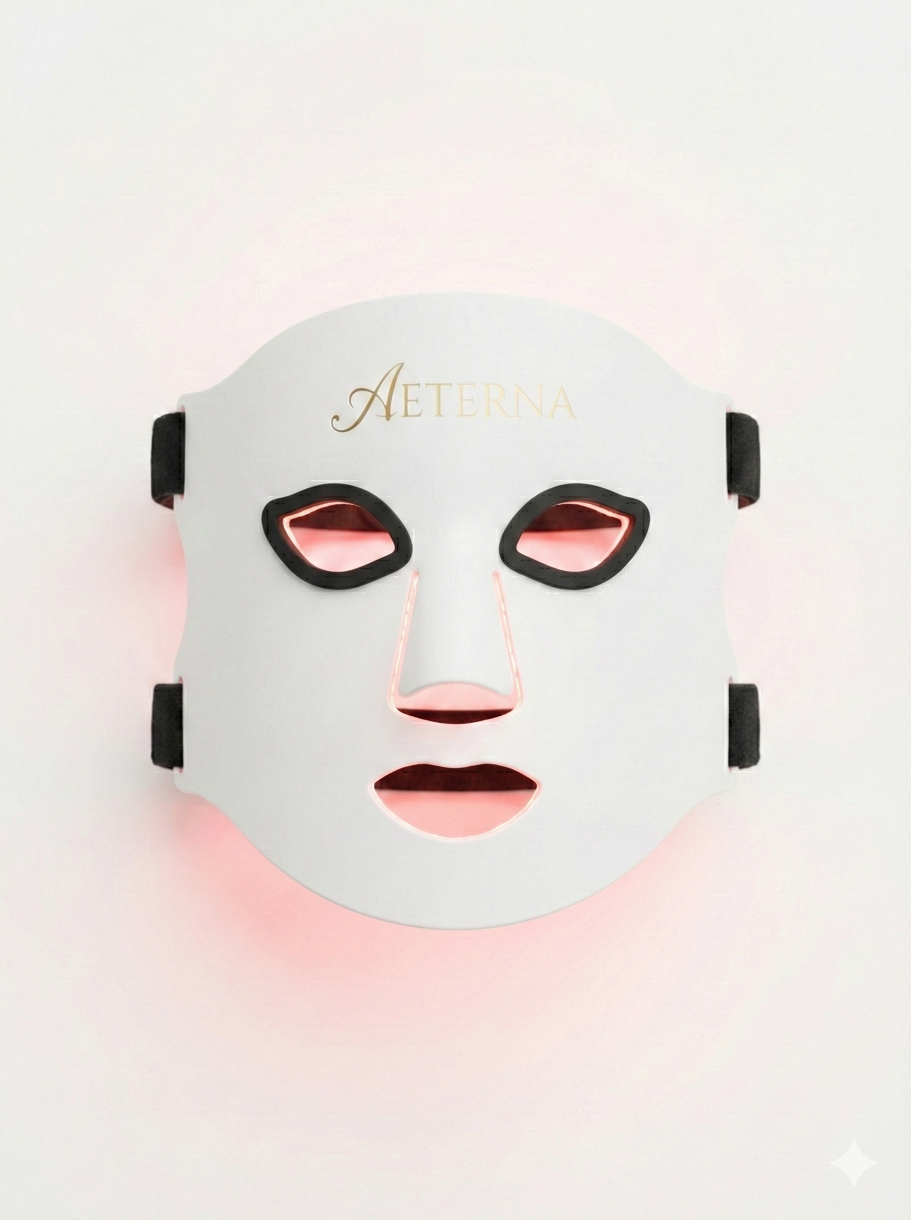 Facial mask with 'Aeterna' branding on a light pink background